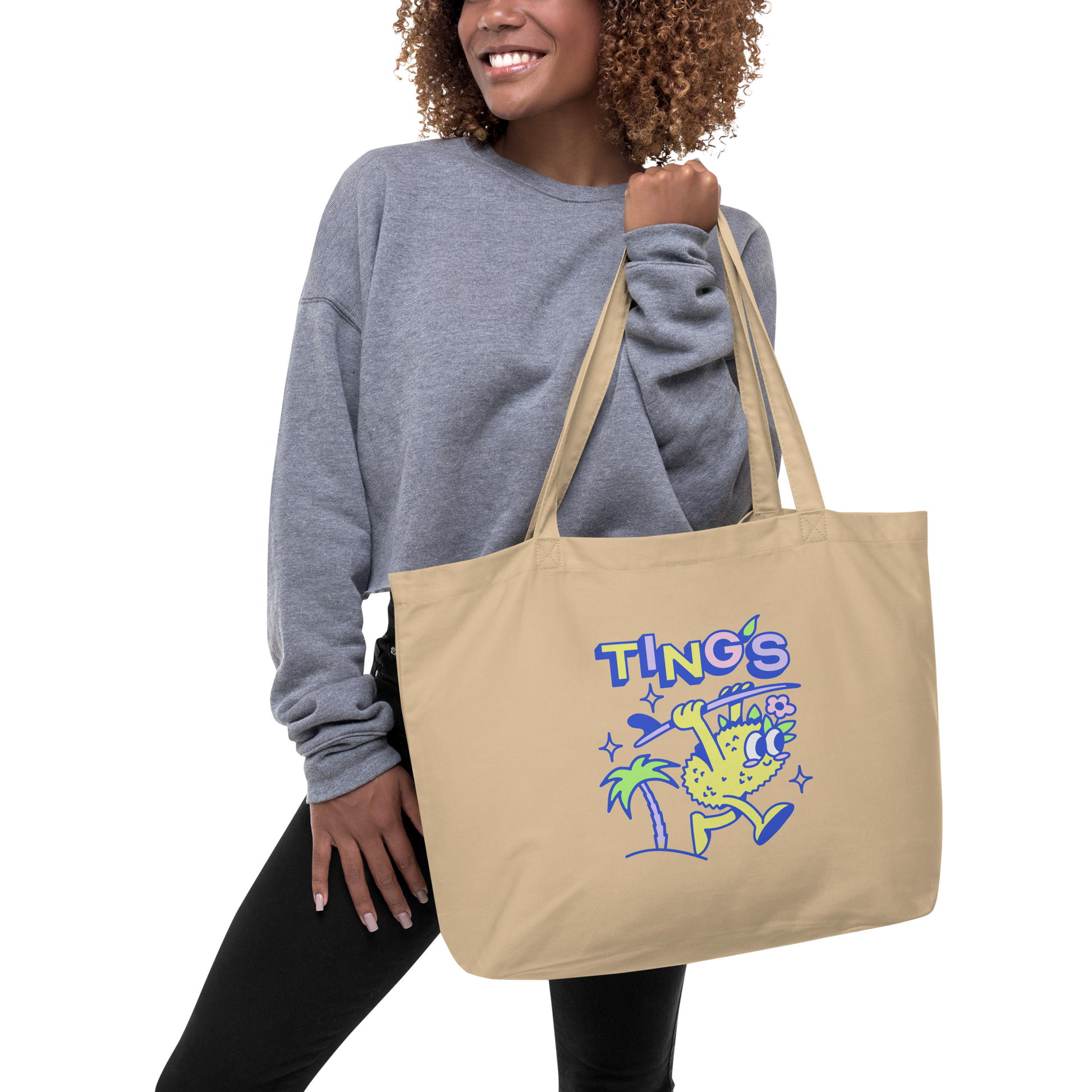 Girl wearing Ting's signature canvas tote