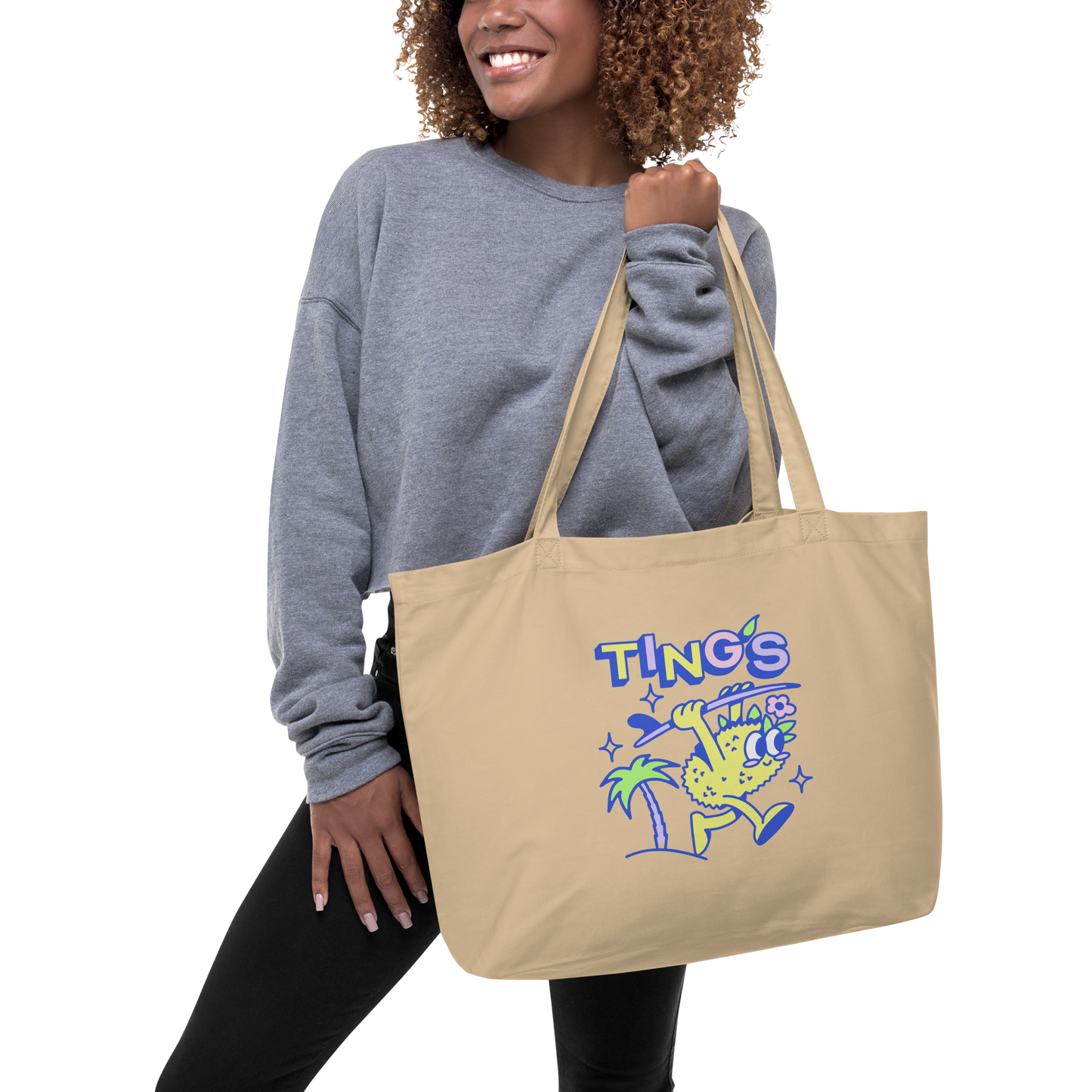 Girl wearing Ting's signature canvas tote