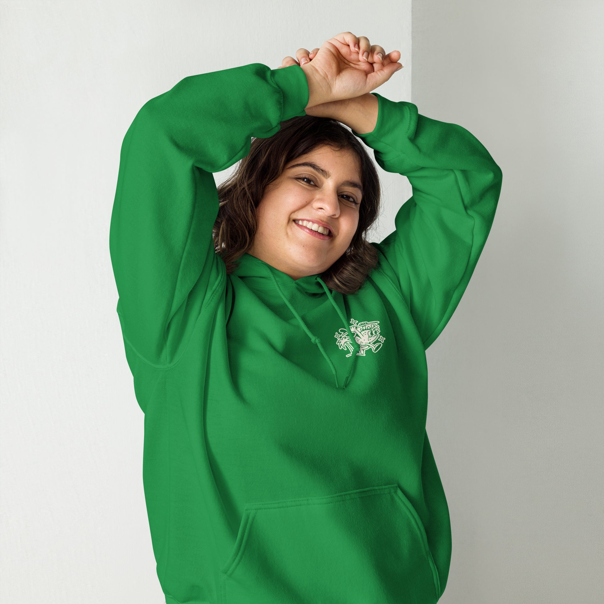 Female model wearing Ting's green unisex hoodie with Ting's logo on front